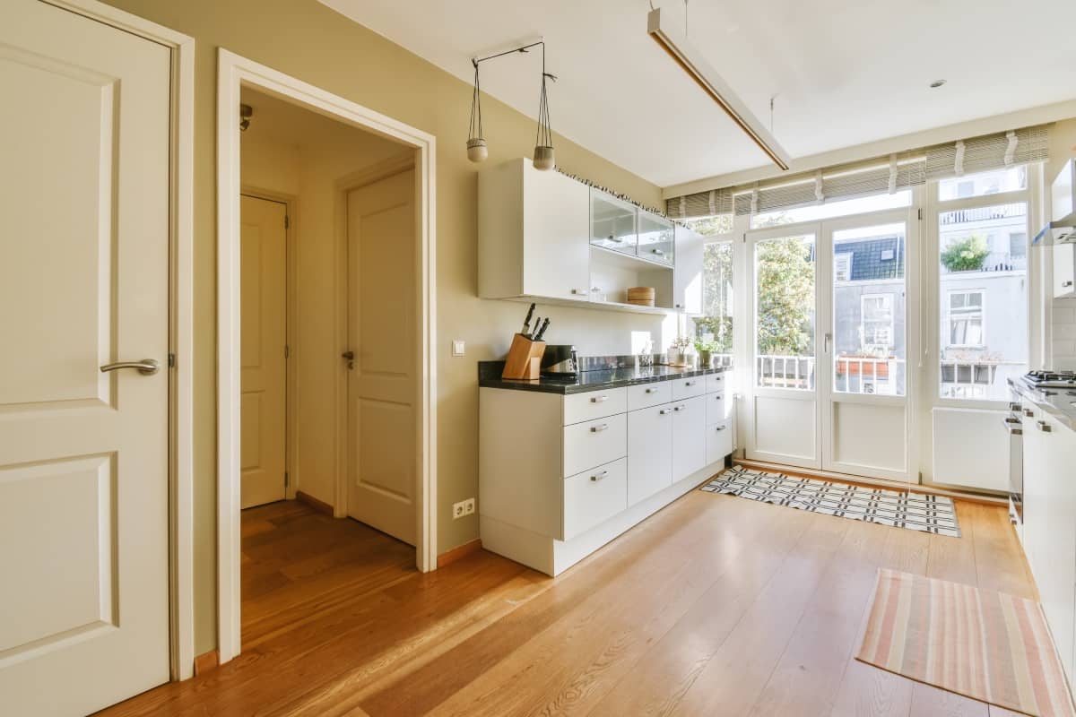 luxurious kitchen area with parquet flooring