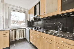 a breathtaking kitchen with wood kitchen unit